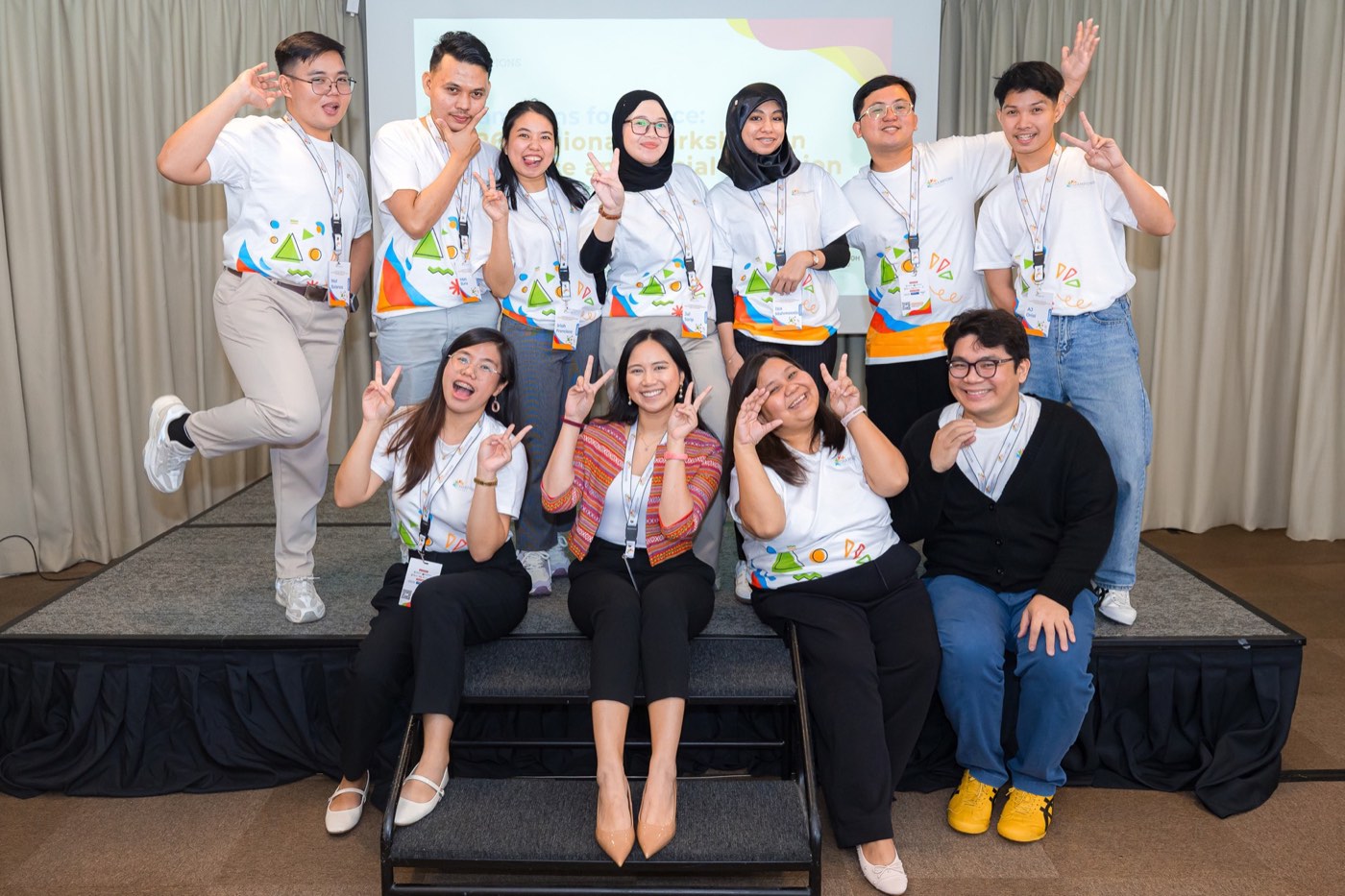 Champions for Peace team on stage at the Singapore Regional Conference, January 2026.