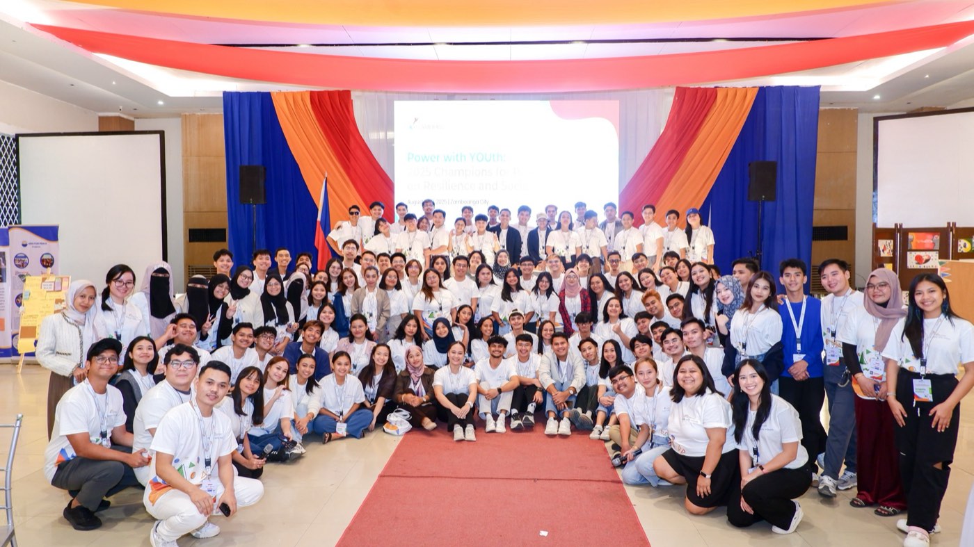 The Champions for Peace marquee sign lit up at the 2025 Zamboanga City training.